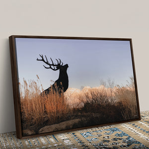 Close-up of an elk canvas print in a handcrafted brown wood float frame.
