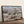 Black framed premium canvas of the Pryor Mountain wild horses gathered among sagebrush and cottonwood trees in Bighorn Canyon, original muted Western landscape photography by Debra Gail Fine Art.