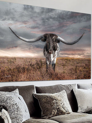 Texas Longhorn wall art on canvas displayed in a rustic farmhouse living room with neutral decor