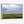 A Flint Hills Kansas fine art natural wood framed canvas print depicting a beautiful green field under a cloudy sky, by Debra Gail.