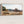 Mormon Row historic barn natural wood float framed panoramic wall art in Grand Teton National Park, Wyoming, photographed by Debra Gail