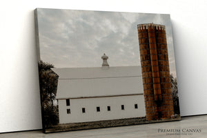 White prairie barn with rustic silo farmhouse wall art in a minimalist rural landscape