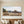 Mormon Row historic barn panoramic wall art in Grand Teton National Park, Wyoming, photographed by Debra Gail