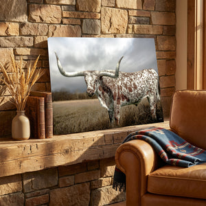 Large Texas Longhorn canvas print displayed over a neutral sofa in a modern farmhouse living room."